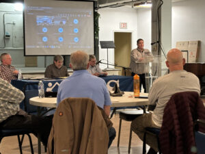 Maria Shior, BES Director of Volunteers, speaking at the 2025 Annual Meeting